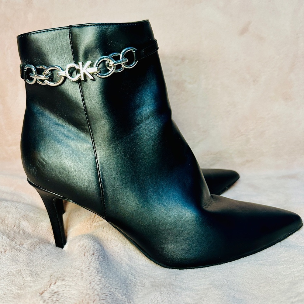Calvin Klein Black Leather Pointed-Toe Ankle Boots with Silver Chain Detail